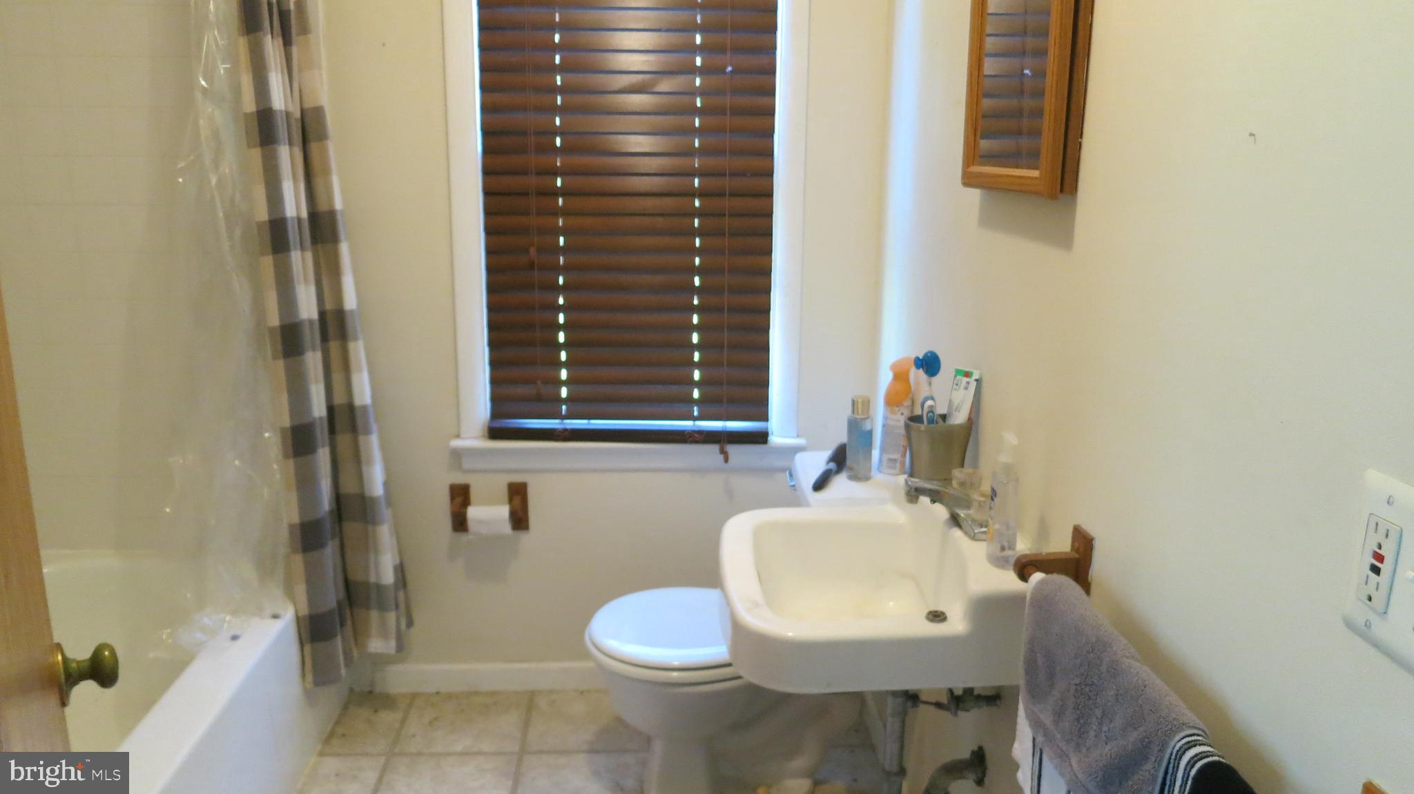 79 Ewingville Road Ewing, NJ 08638 - Photo 55 of 67 a bathroom with a sink toilet and mirror