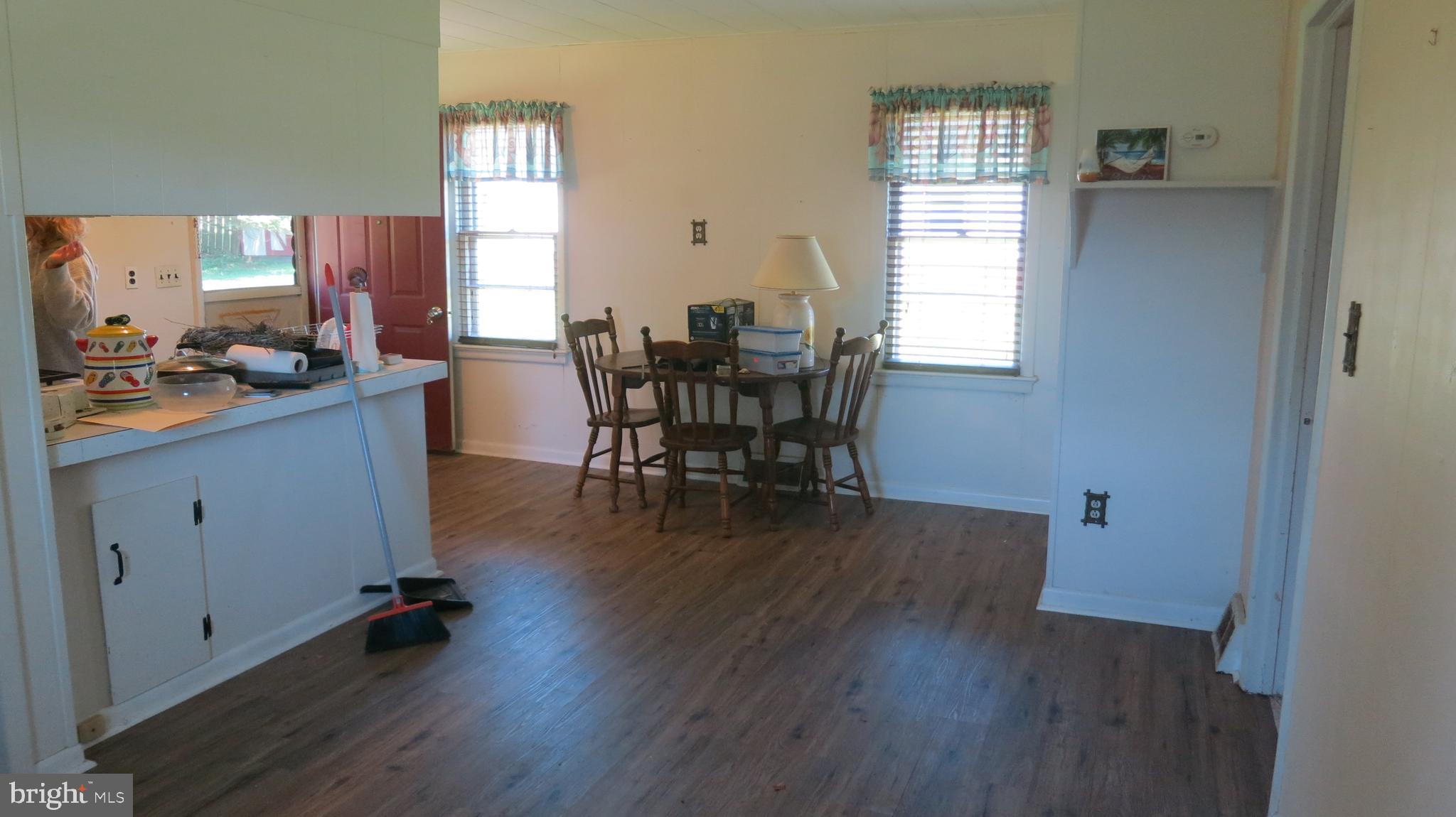 79 Ewingville Road Ewing, NJ 08638 - Photo 60 of 67 a dining room with furniture and wooden floor