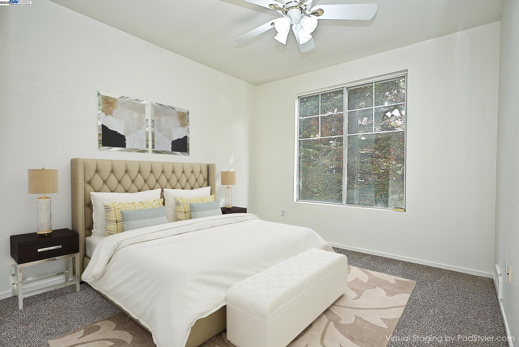 280 Caldecott Lane, Unit 221 Oakland, CA 94618 - Photo 13 of 31 a bedroom with a large bed and a window