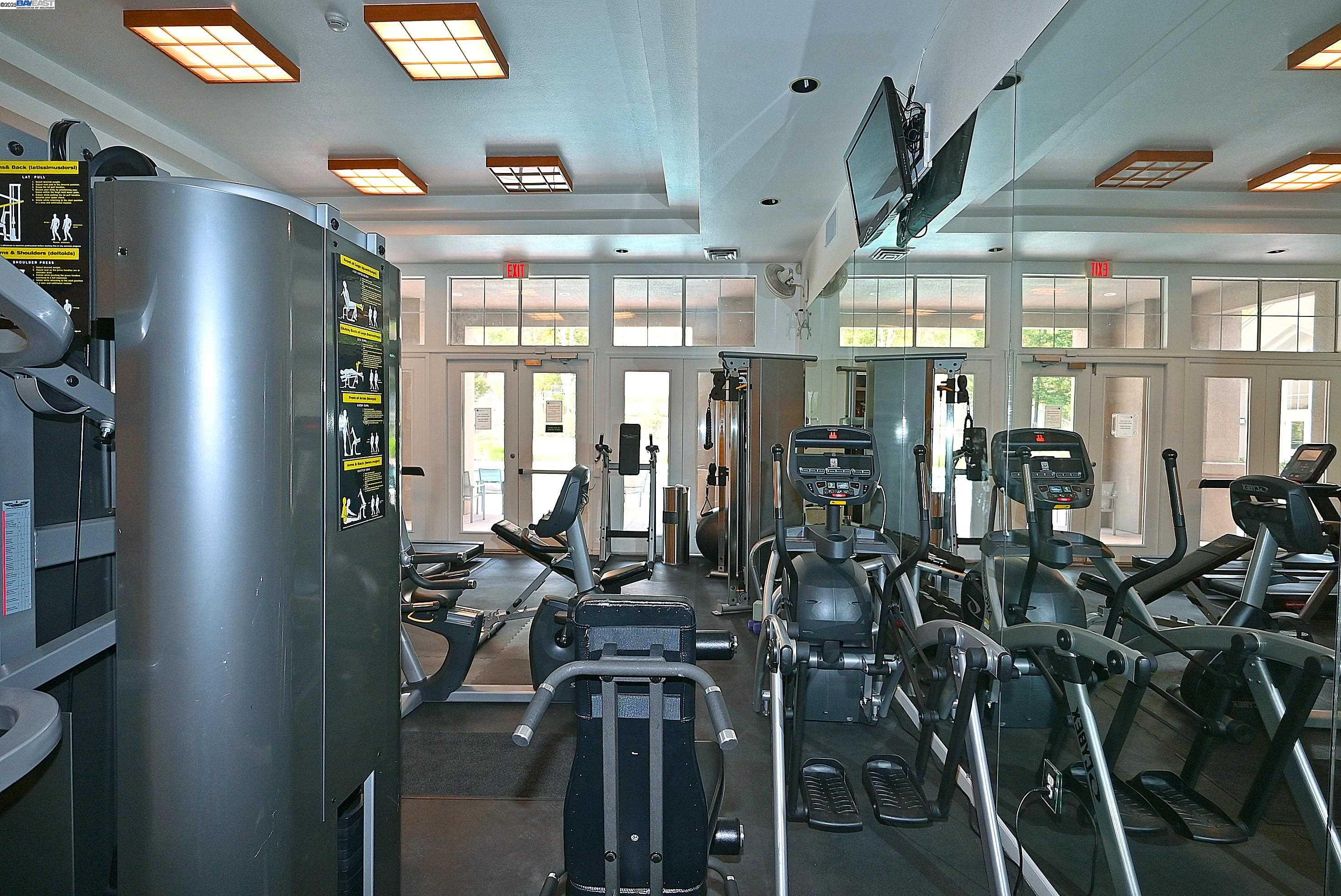 280 Caldecott Lane, Unit 221 Oakland, CA 94618 - Photo 27 of 31 a view of a room with gym equipment