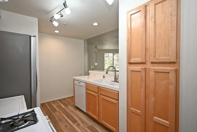 a bathroom with a sink a mirror and a vanity