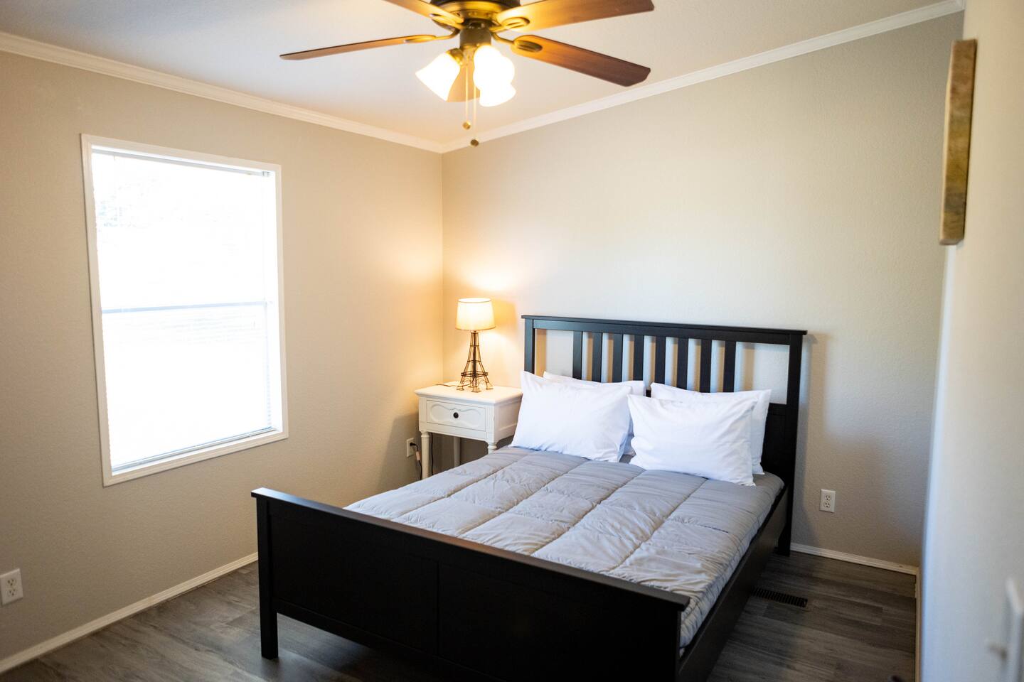 1901 Harmon Hills Road Dripping Springs, TX 78620 - Photo 25 of 27 a bedroom with a bed and window