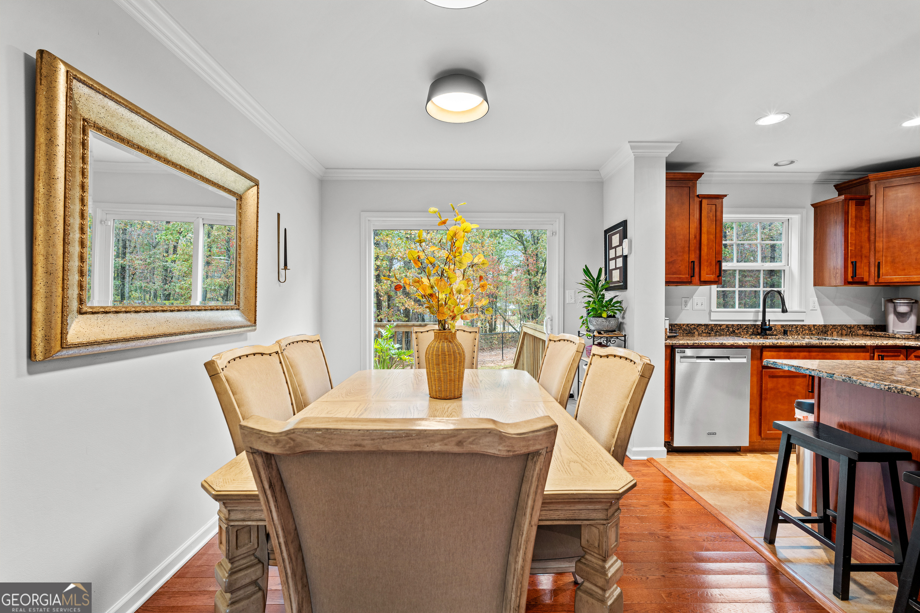 91 Rosemary Way Buchanan, GA 30113 - Photo 11 of 38 a dining room with furniture and wooden floor