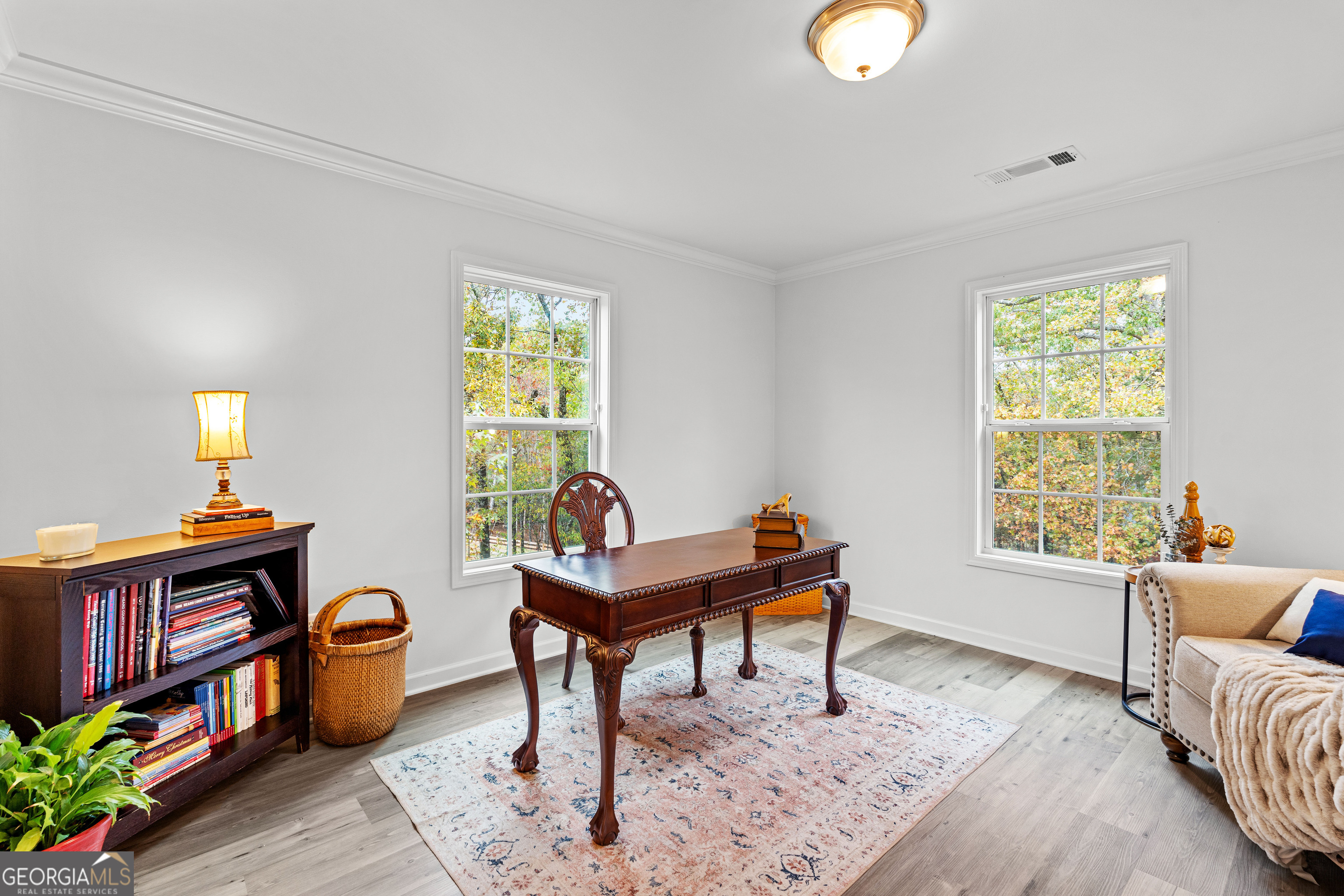 91 Rosemary Way Buchanan, GA 30113 - Photo 22 of 38 a living room with furniture and a window
