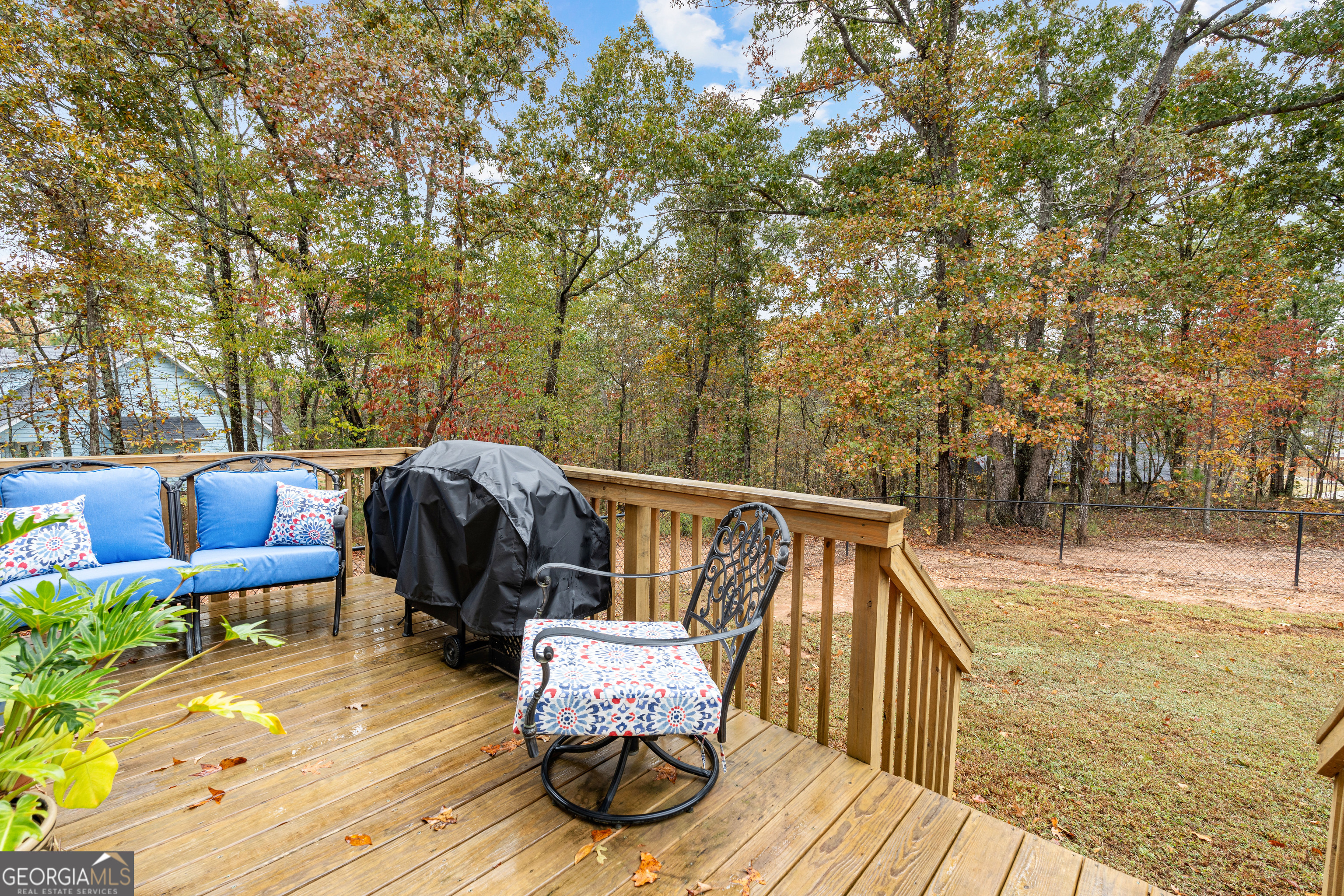91 Rosemary Way Buchanan, GA 30113 - Photo 34 of 38 a view of a roof deck with furniture