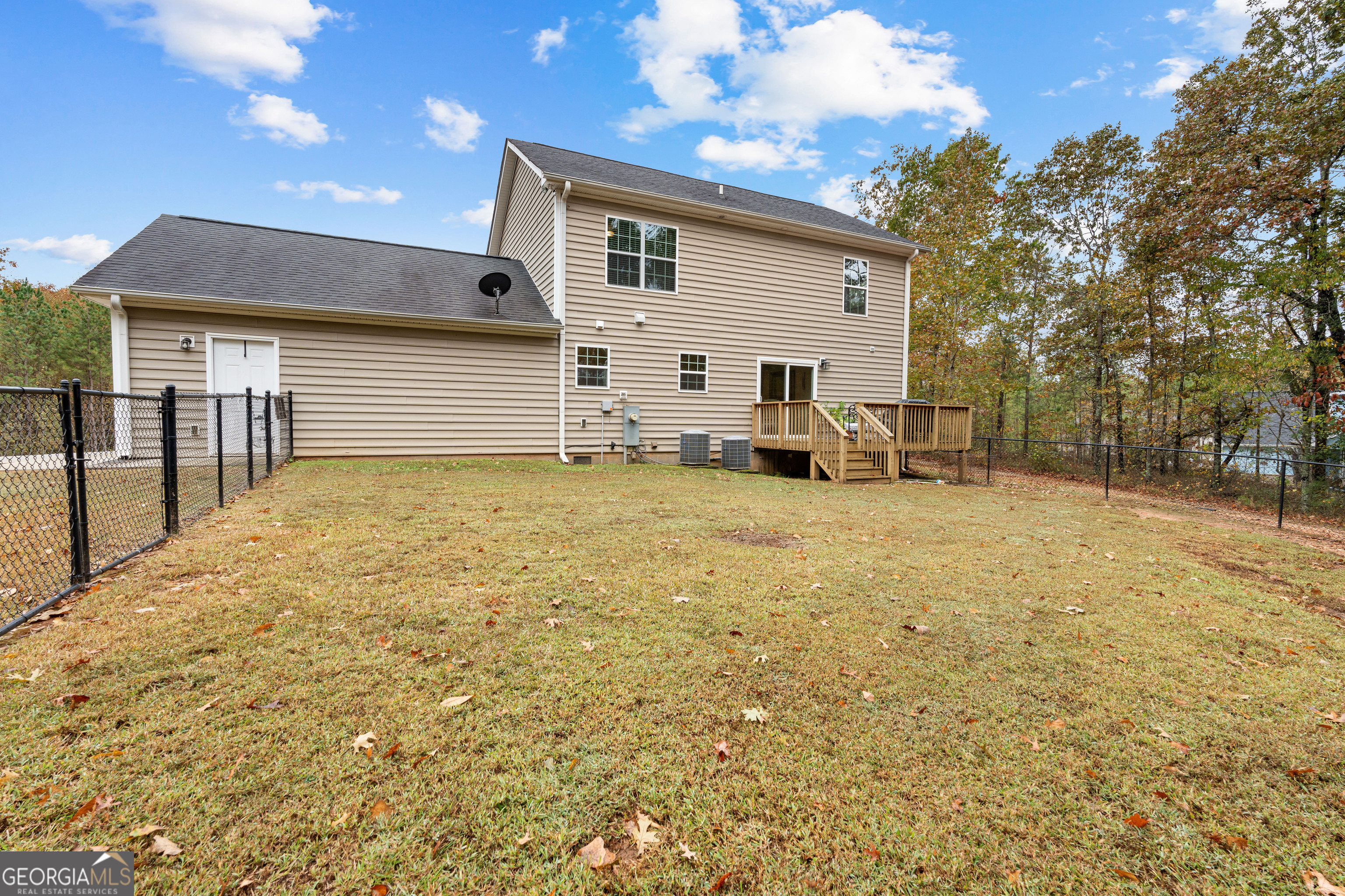 91 Rosemary Way Buchanan, GA 30113 - Photo 36 of 38 a view of a house with a yard
