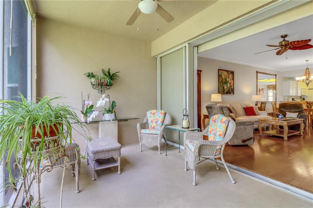 3715 Buttonwood Way, Unit 1711 Naples, FL 34112 - Photo 18 of 40 Back lanai, newer fan