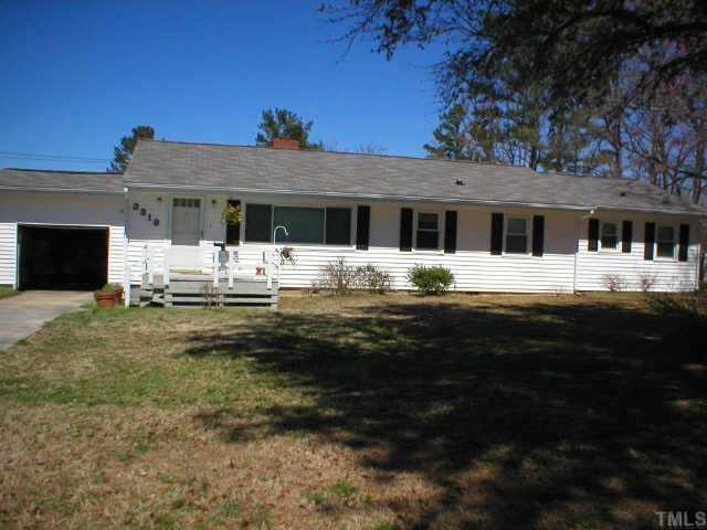 3319 Trawick Road Raleigh, NC 27604 - Photo 1 of 1 a front view of a house with a yard