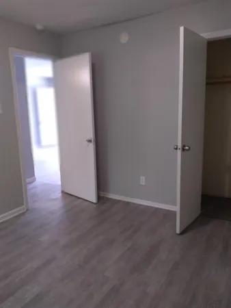 a white toilet sitting next to a bathroom sink