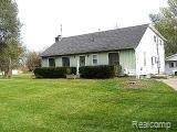 1458 Decker Road Walled Lake, MI 48390 - Photo 2 of 4 decker front2.jpg