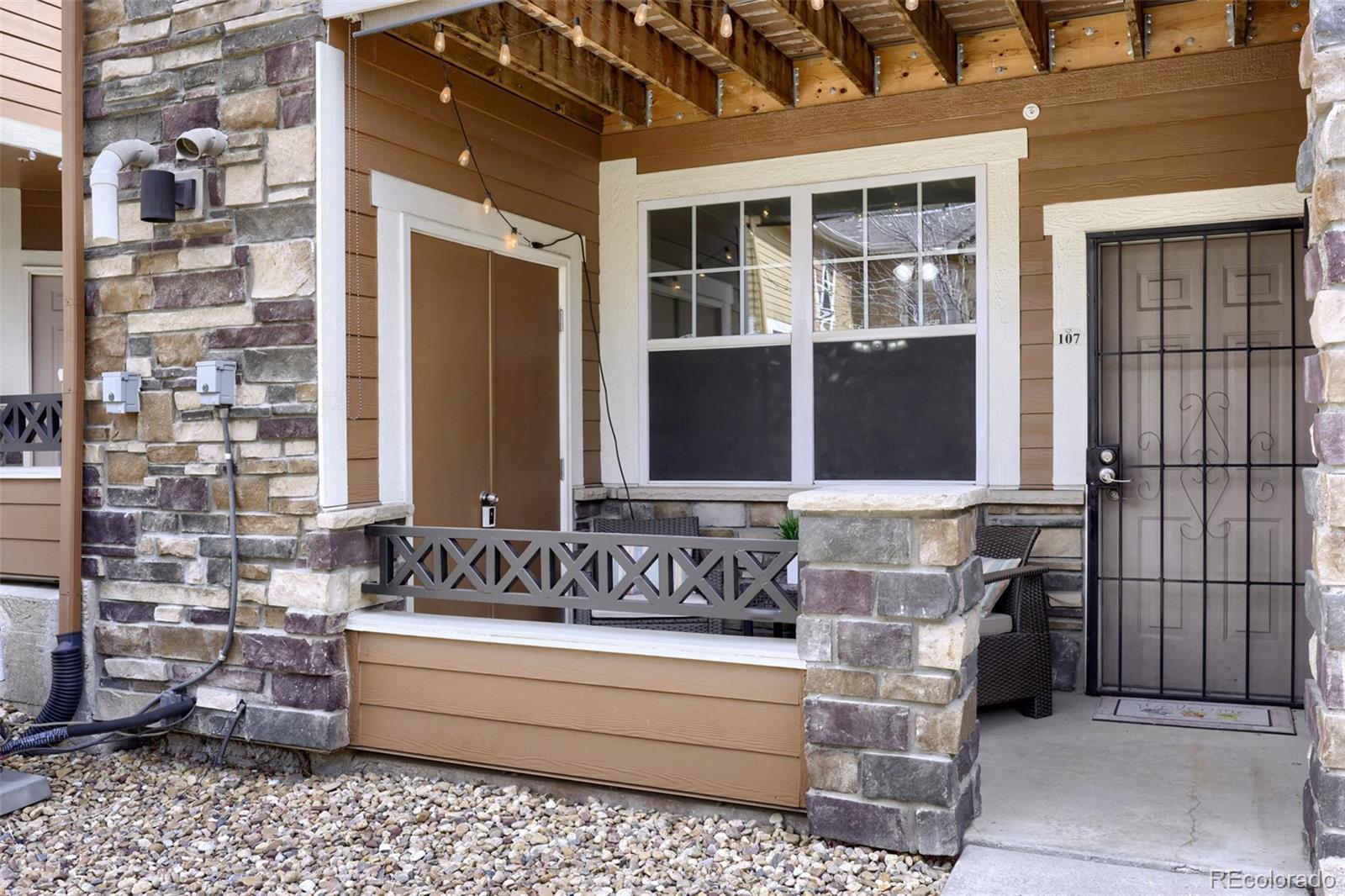 a view of front door of house with a window