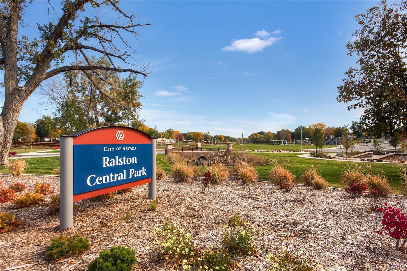7130 Simms Street, Unit 107 Arvada, CO 80004 - Photo 21 of 29 a sign board with a lake view