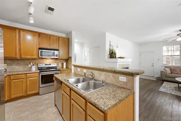 $330,000 | 7130 Simms Street, Unit 107, Arvada, CO 80004