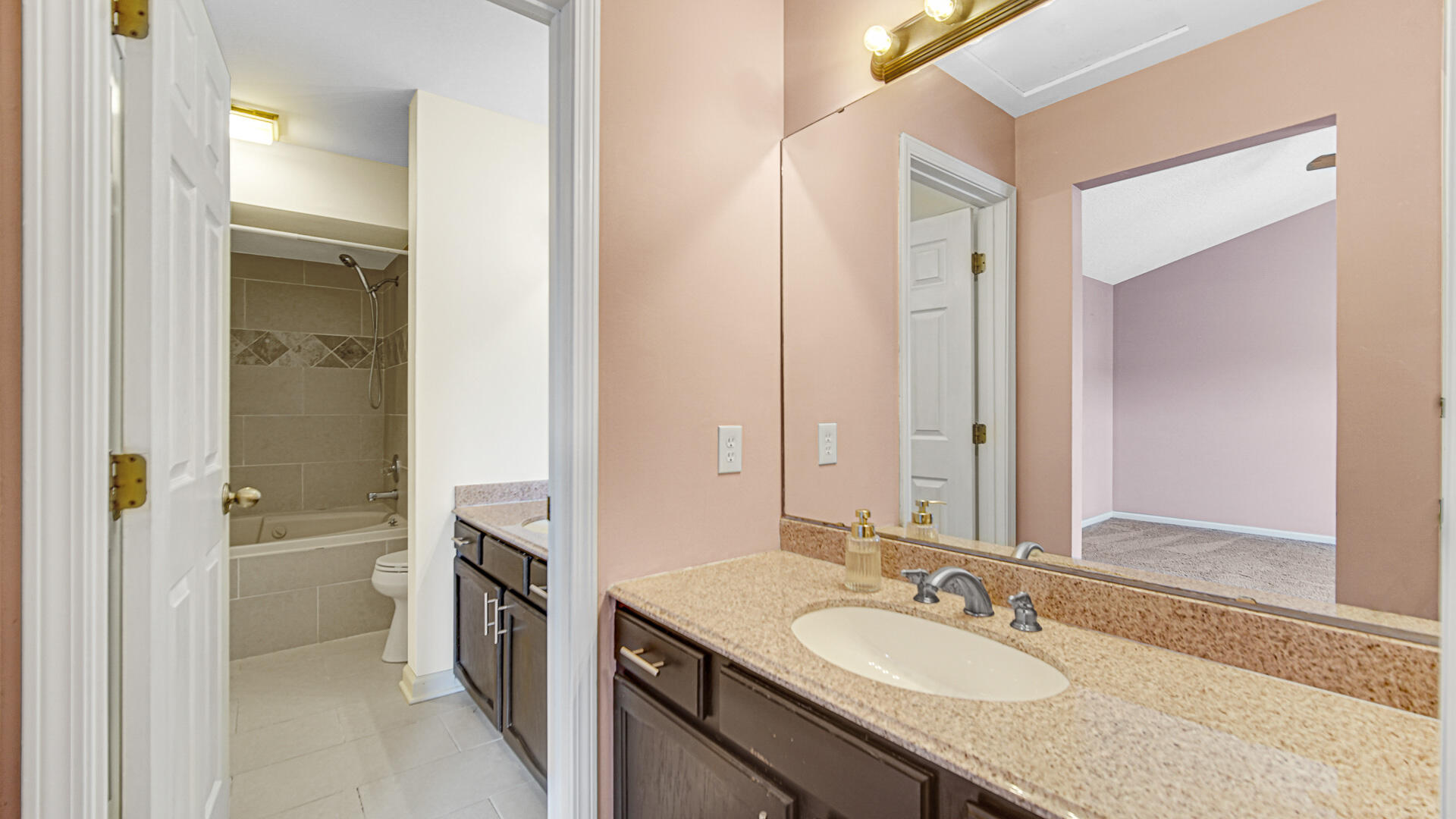 771 Kenmare Parkway Crown Point, IN 46307 - Photo 15 of 20 a bathroom with a granite countertop sink double and mirror