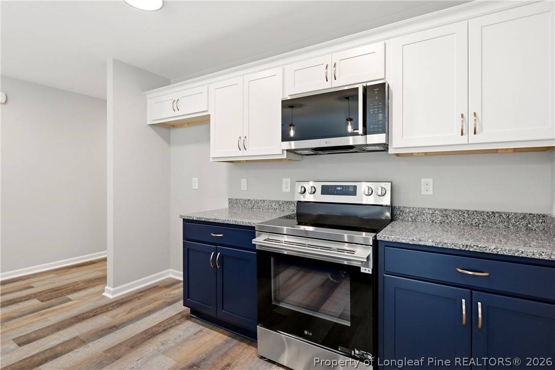 2629 Dumbarton Road Fayetteville, NC 28306 - Photo 11 of 48 Two-tone cabinet design
