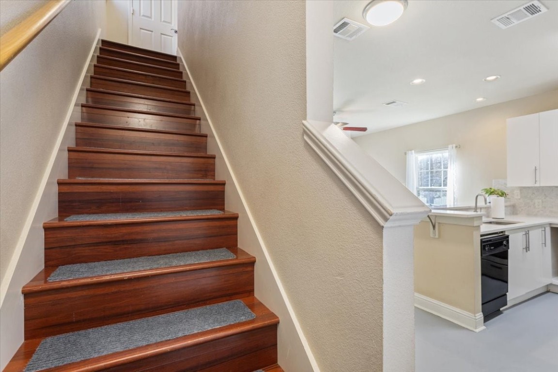 1210 East M. Franklin Avenue, Unit B Austin, TX 78721 - Photo 16 of 31 The neutral color palette allows you to easily personalize the area with your style. It’s a cozy, functional space designed for everyday living.