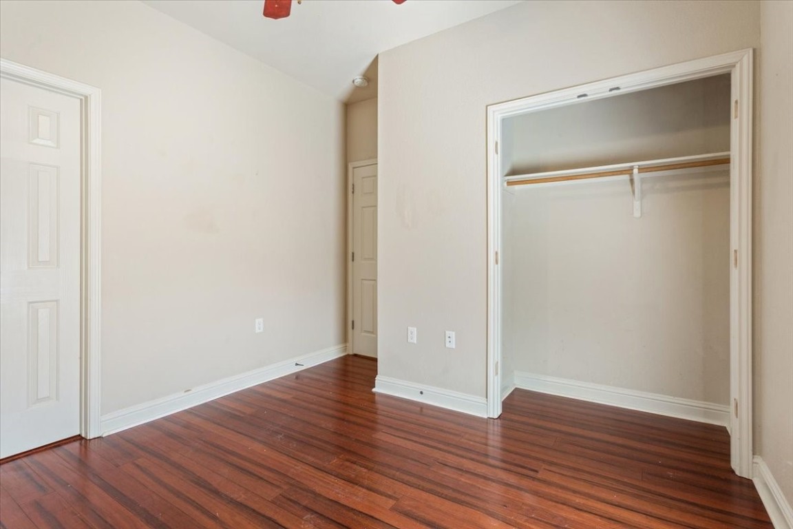 1210 East M. Franklin Avenue, Unit B Austin, TX 78721 - Photo 23 of 31 The primary bedroom offers a calm and comfortable retreat with neutral tones and soft natural light.