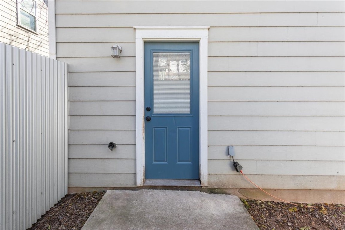 1210 East M. Franklin Avenue, Unit B Austin, TX 78721 - Photo 28 of 32 Enjoy outdoor living in your own spacious, private fenced yard — a rare find in East Austin.