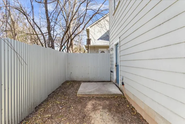 a view of a swimming pool with a house