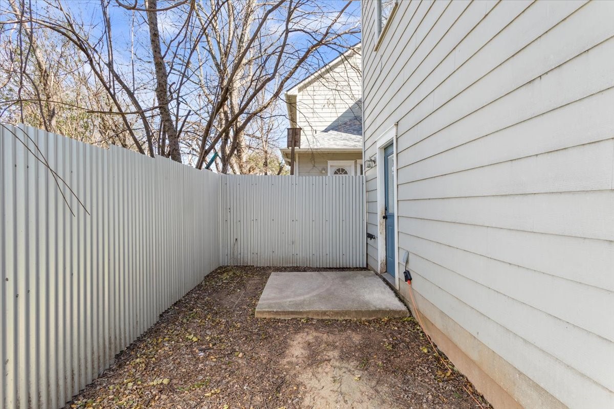 1210 East M. Franklin Avenue, Unit B Austin, TX 78721 - Photo 29 of 31 Mature trees and privacy fencing create a peaceful escape from the city buzz.