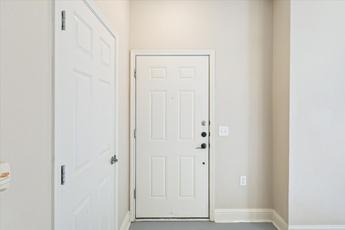 1210 East M. Franklin Avenue, Unit B Austin, TX 78721 - Photo 6 of 32 a view of a hallway with wooden floor