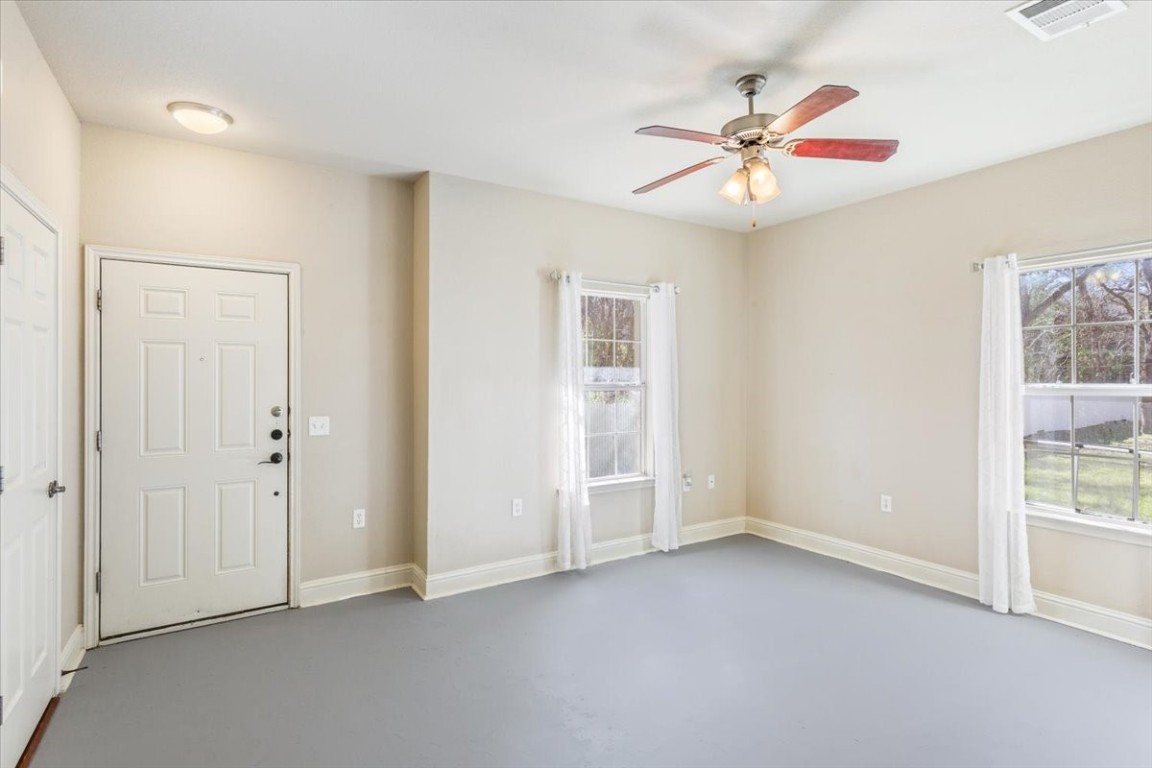 1210 East M. Franklin Avenue, Unit B Austin, TX 78721 - Photo 6 of 31 Step into a bright and open living area filled with natural light.