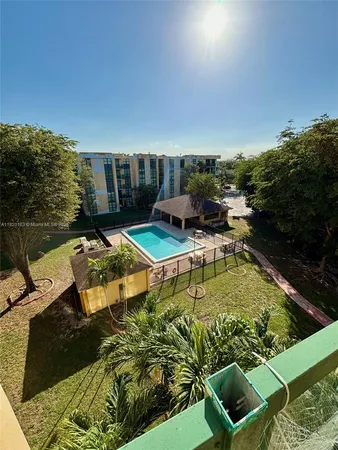 a swimming pool with outdoor view