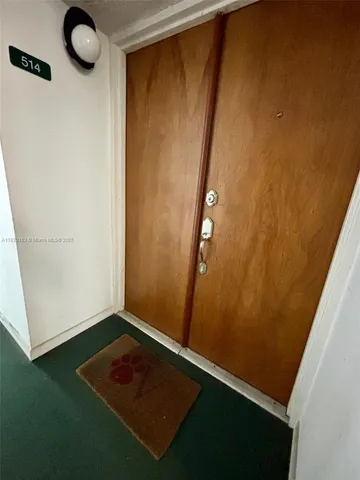 a living room with couch and a table