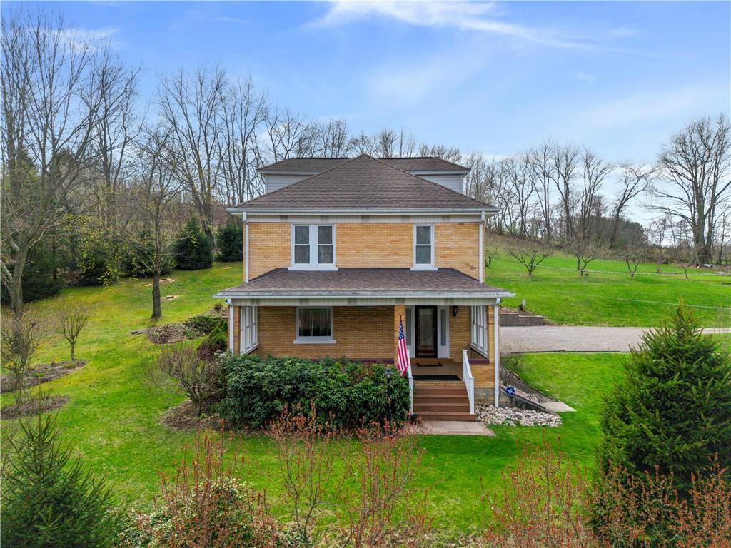147 Ralston Road Sarver, PA 16055 - Photo 1 of 39 a front view of house with yard and green space