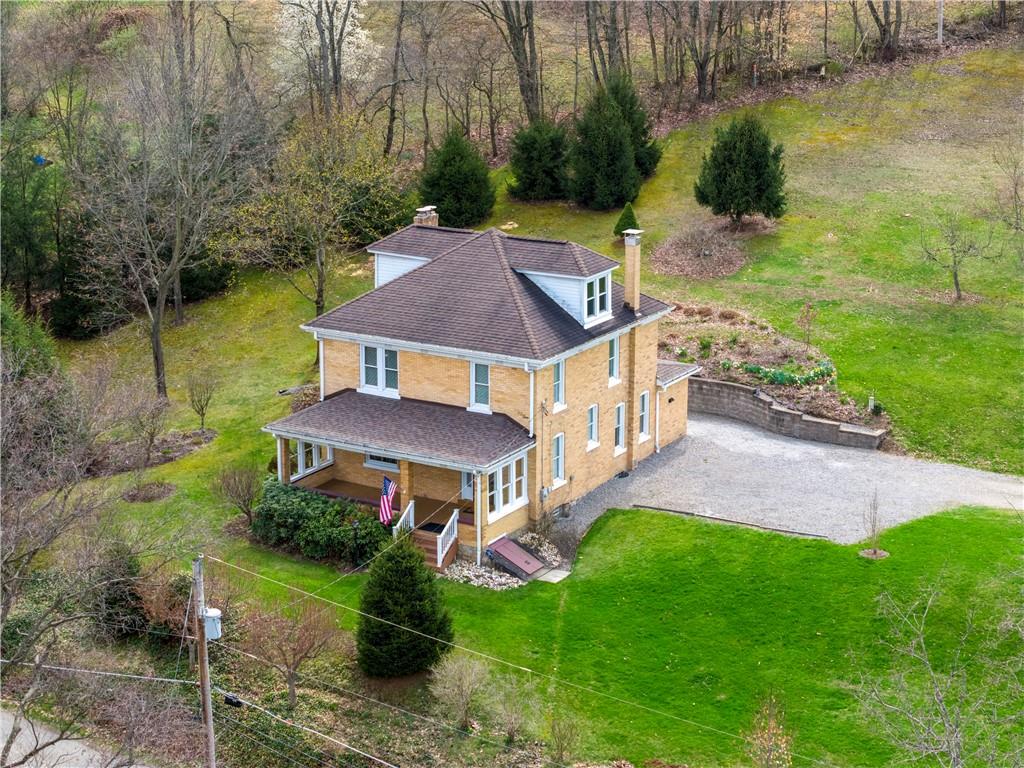 147 Ralston Road Sarver, PA 16055 - Photo 2 of 39 a front view of a house with garden