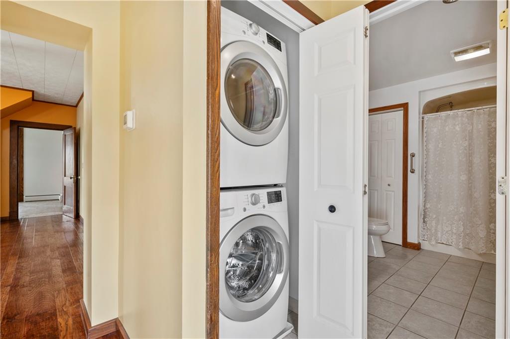 147 Ralston Road Sarver, PA 16055 - Photo 22 of 39 a view of a storage and utility room with washer and dryer
