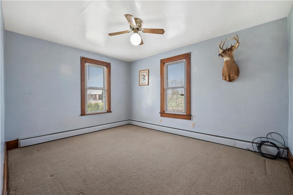 147 Ralston Road Sarver, PA 16055 - Photo 27 of 39 an empty room with windows and fan