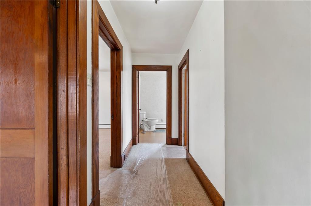 147 Ralston Road Sarver, PA 16055 - Photo 28 of 39 a view of a hallway with wooden shelves