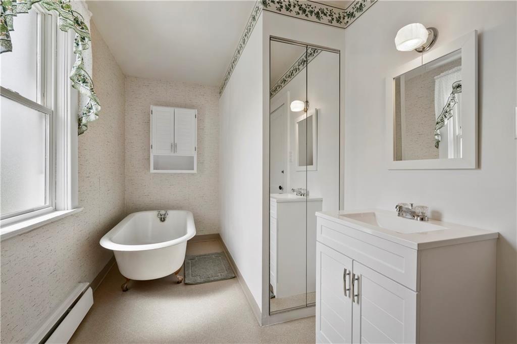 147 Ralston Road Sarver, PA 16055 - Photo 30 of 39 a bathroom with a tub sink and mirror