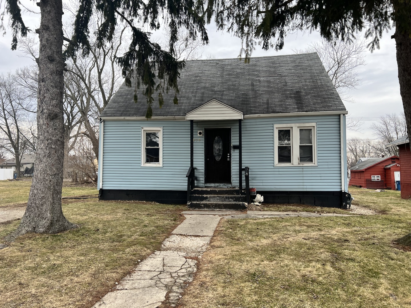a front view of a house with yard