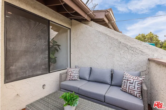 a view of a couch in the patio
