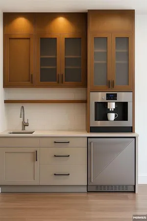 a kitchen with granite countertop white cabinets and stainless steel appliances