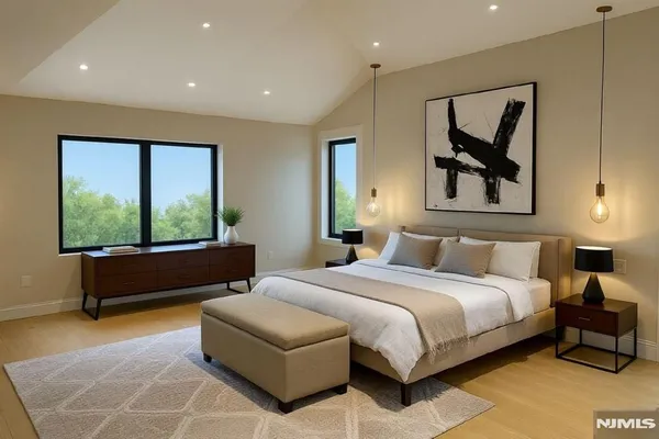 a bedroom with a bed and glass window