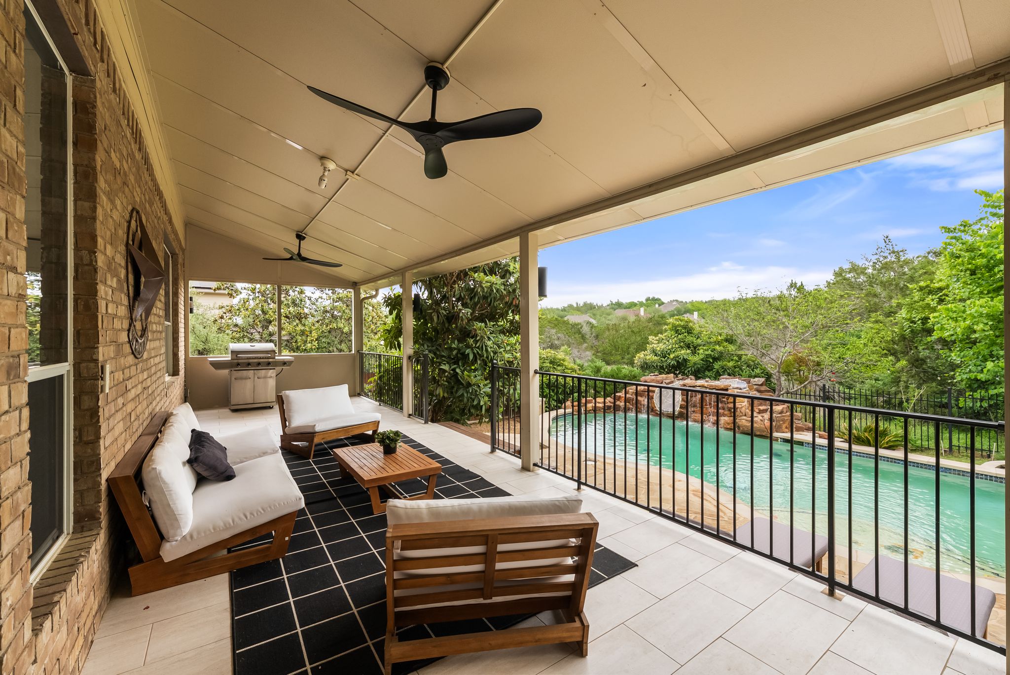 2429 Shire Ridge Drive Austin, TX 78732 - Photo 32 of 39 a outdoor space with patio lots of furniture
