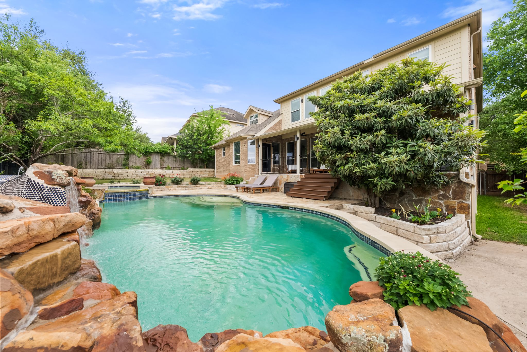 2429 Shire Ridge Drive Austin, TX 78732 - Photo 33 of 39 a swimming pool with outdoor seating and yard