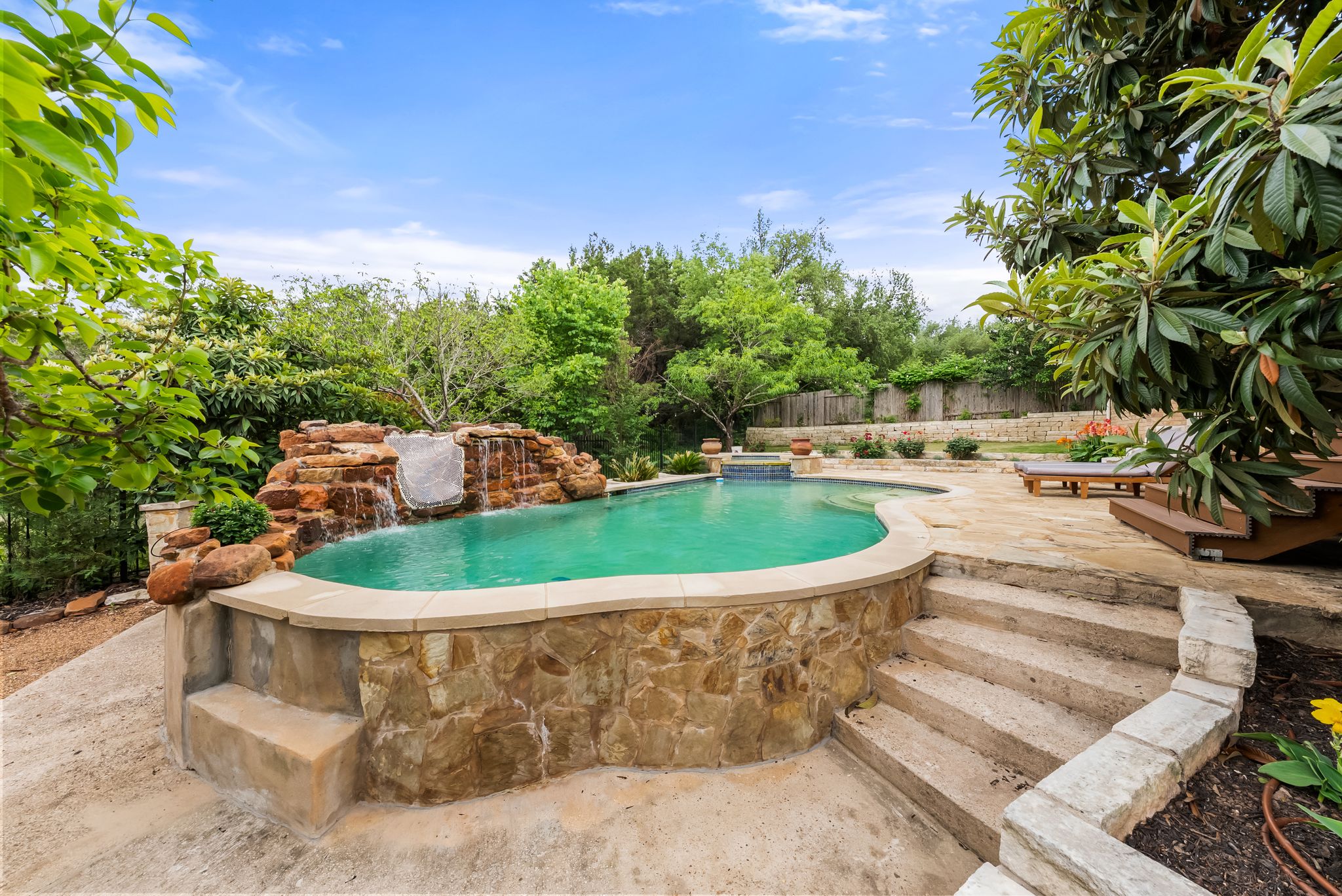 2429 Shire Ridge Drive Austin, TX 78732 - Photo 35 of 39 a view of a swimming pool with a patio