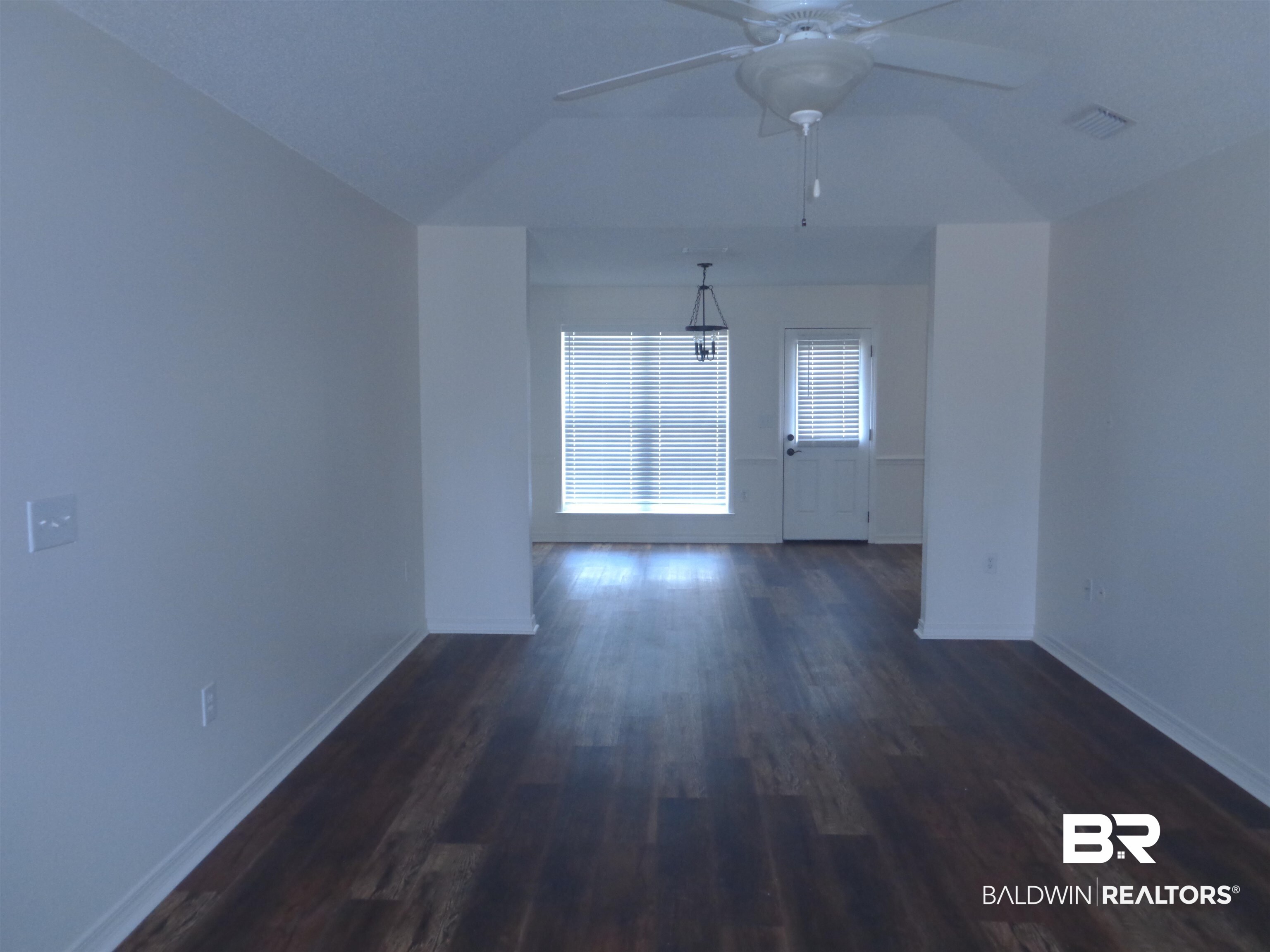 1557 Majesty Loop Foley, AL 36535 - Photo 5 of 25 View of dining room from the living room.