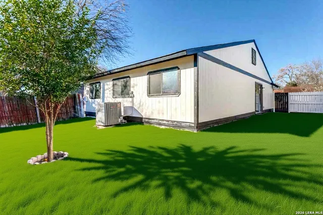 a view of a backyard with garden