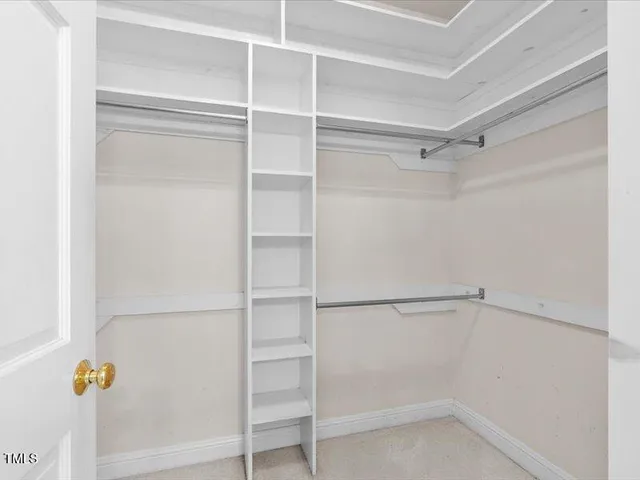 a white bath tub sitting next to a window