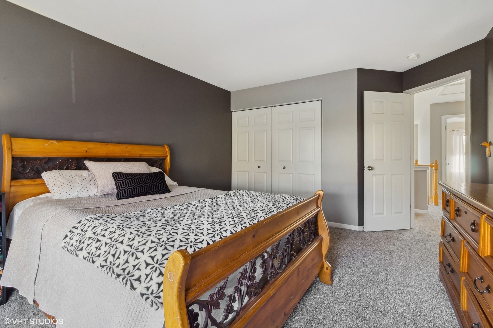 7802 Briarcliff Drive Plainfield, IL 60586 - Photo 11 of 26 a bedroom with a bed and wooden floor