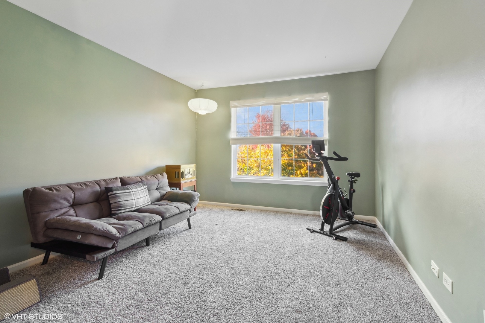 7802 Briarcliff Drive Plainfield, IL 60586 - Photo 12 of 26 a living room with furniture and a window