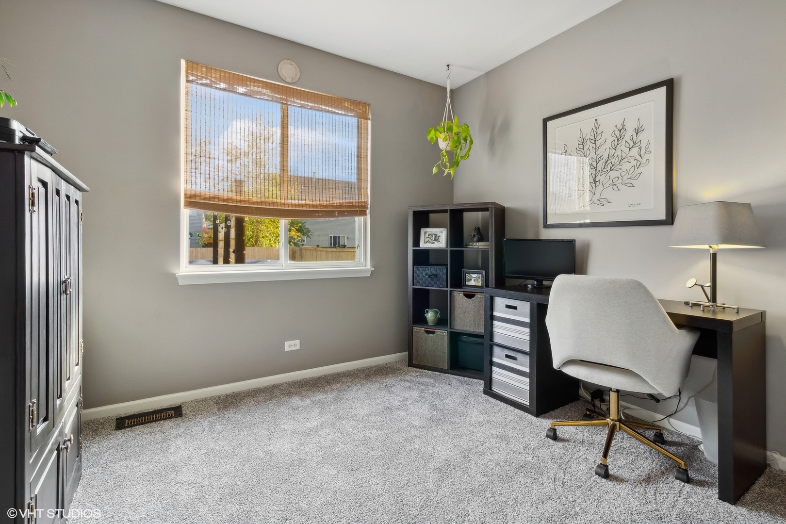 7802 Briarcliff Drive Plainfield, IL 60586 - Photo 16 of 26 a workspace with lounge chair and a window