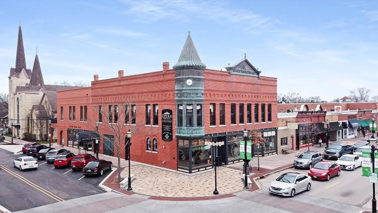 7802 Briarcliff Drive Plainfield, IL 60586 - Photo 22 of 26 a view of a car park in front of a building