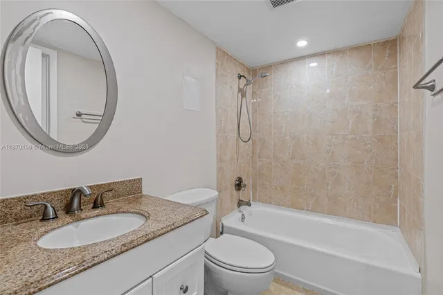 a view of kitchen with two windows