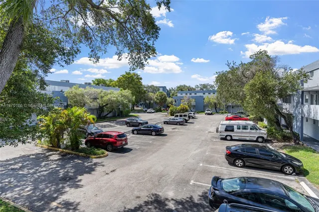 a view of a lake with a house in the background